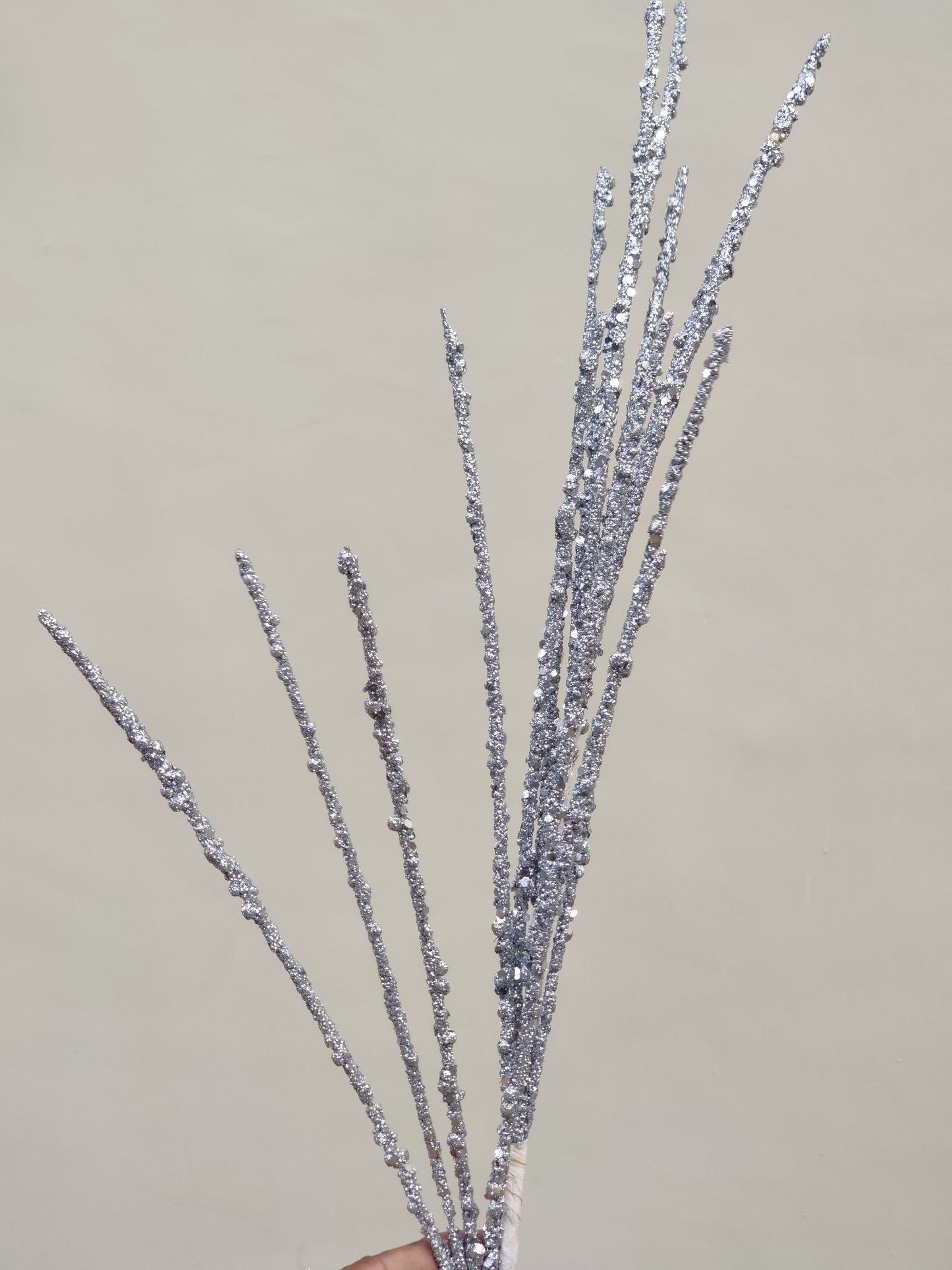 Silver glitter artificial spray