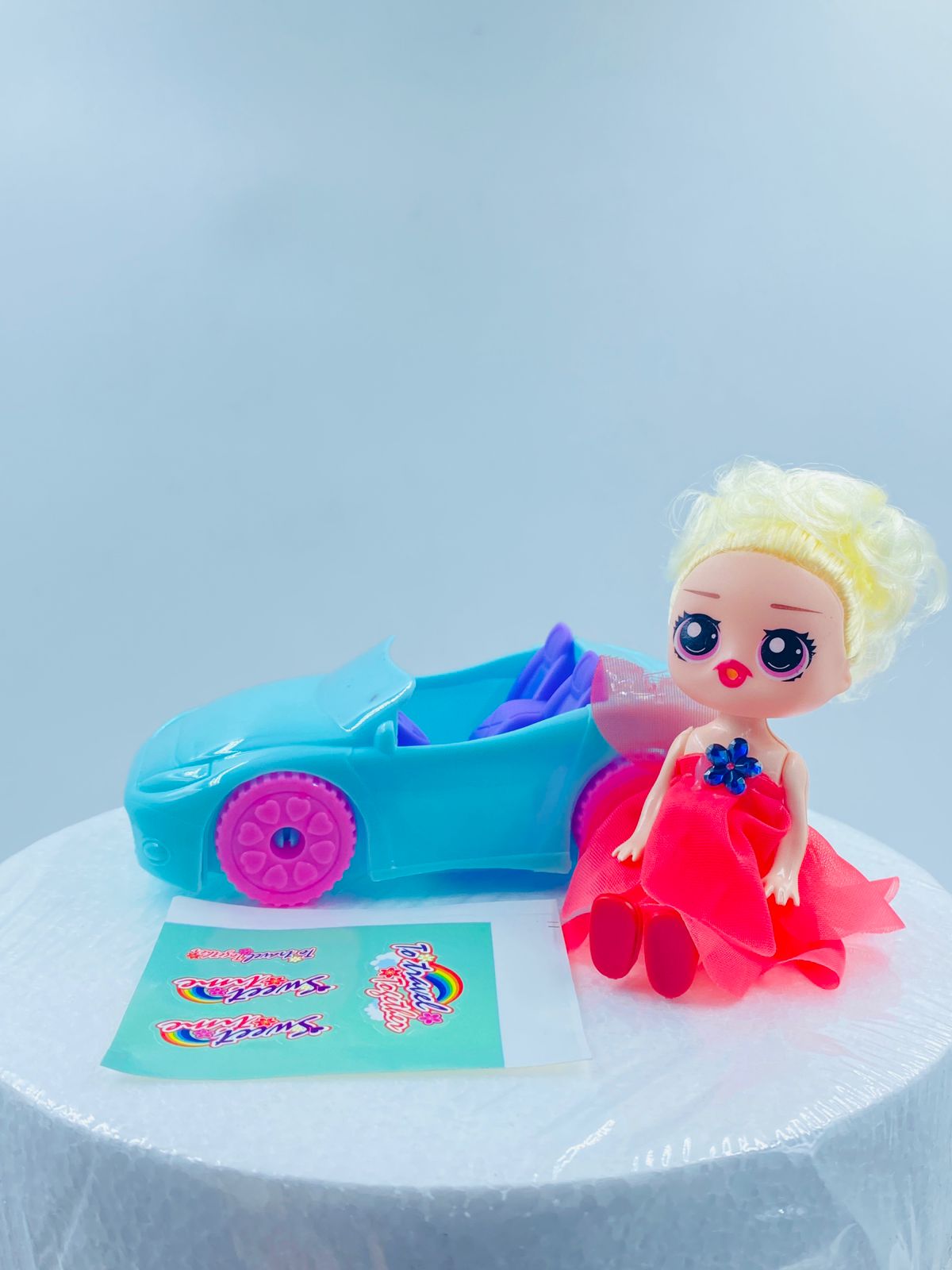 Car toy topper with doll (Random doll)